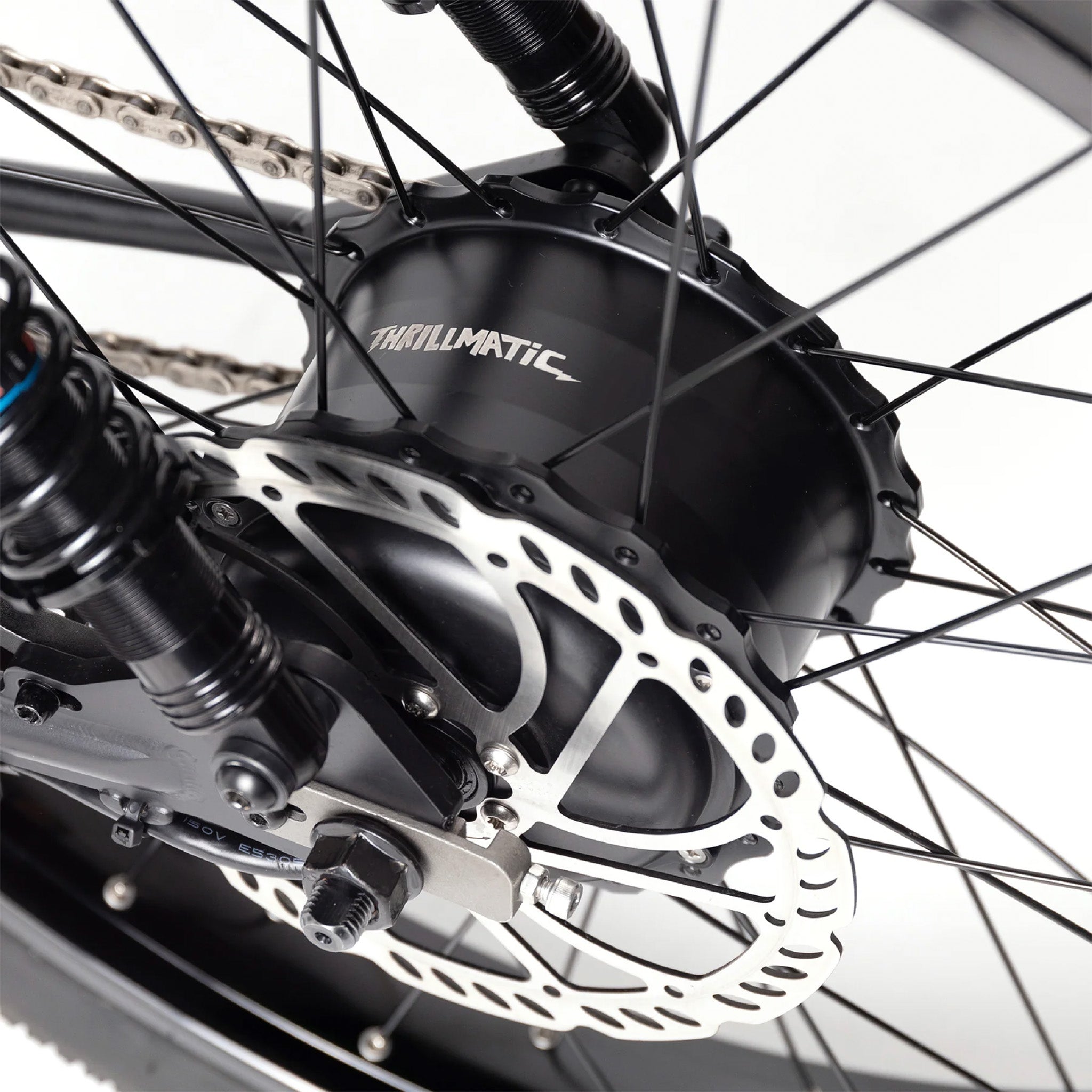 Close-up of a bicycle hub with 'Thurlow-Matic' branding on a white background