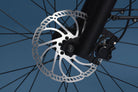 Front disc brake rotor on RadKick Arctic Blue electric bike