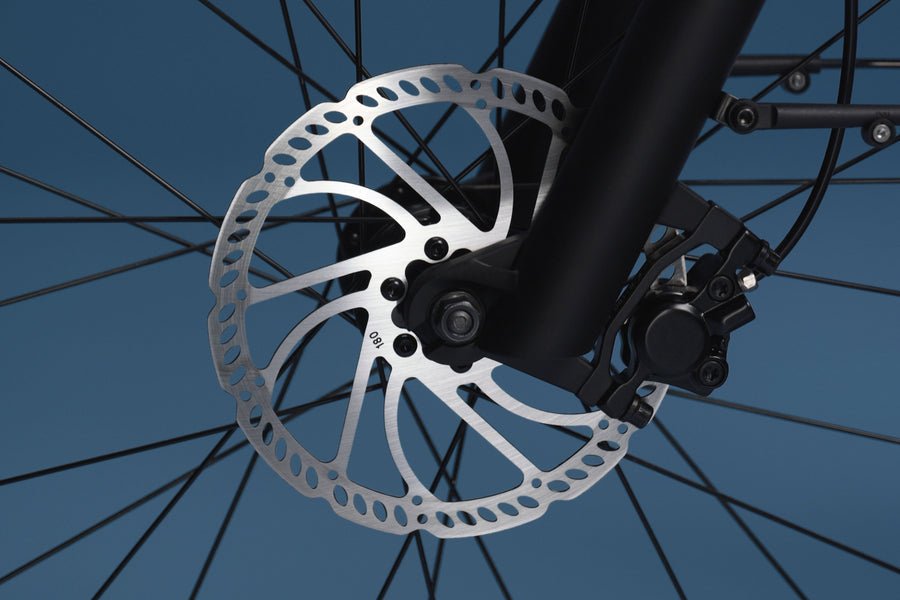 Front disc brake rotor on RadKick Arctic Blue electric bike