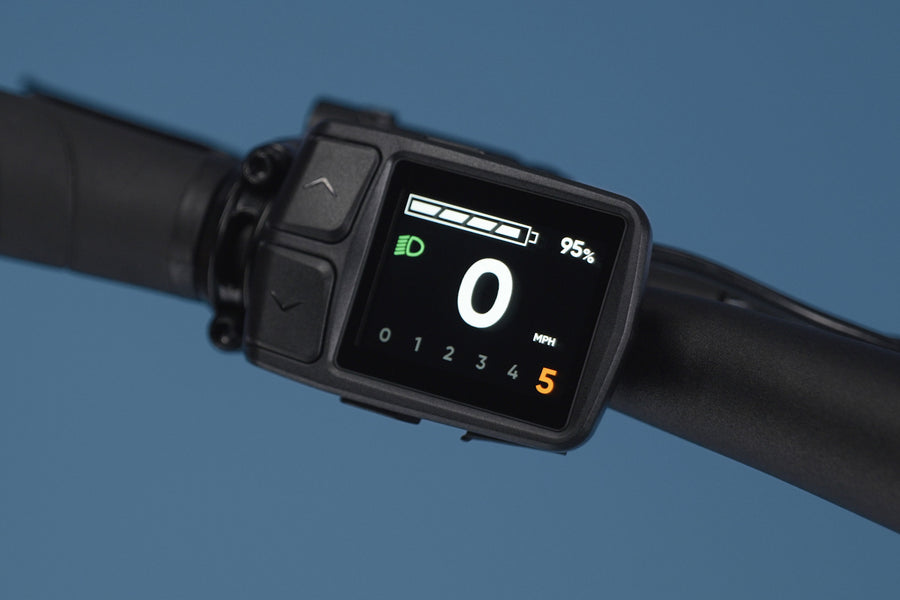 Close-up of RadKick Arctic Blue electric bike LCD display showing speed and battery level